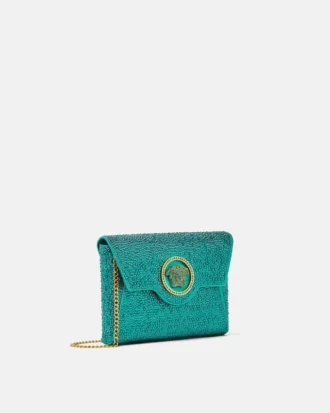 La Medusa-pyntet satengclutch