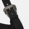 Ribbet topp med barokk spenne